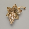Broche-pendentif «Fleur» avec cristaux jaunes et métal doré, 43×60 mm