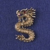 Broche-pendentif «Dragon» avec strass jaunes, métal doré 40 × 23 mm +
