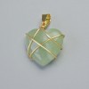 Pendentif «Cœur» en jade dans un maillage doré, diamètre 20×20 mm, longueur ±30 mm