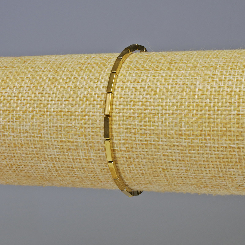 Bracelet en hématite doré, éléments rectangulaires de 7 × 2 mm, longueur 18 cm, élastique