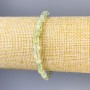Bracelet en préhnite facetté, diamètre 6×5 mm ±, longueur 18 cm ±, élastique