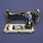 Broche machine à coudre émaillée couleur métal doré 30×42 mm+