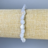 Bracelet en calcédoine, perles roulées, diamètre 5-8×6 mm, longueur environ 18 cm, élastique