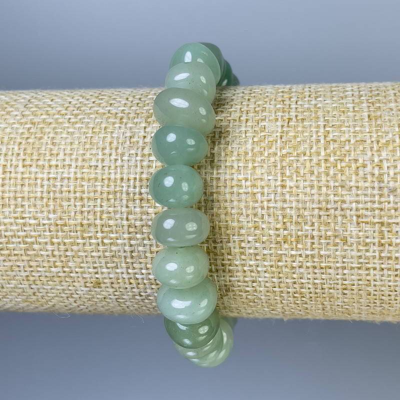 Bracelet en néphrite roulée, diamètre 11×8 mm, longueur ±18 cm, élastique