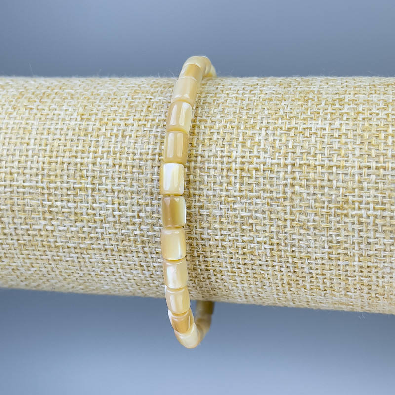 Bracelet nacre taillée, diamètre 6×5 mm, longueur 18 cm, élastique