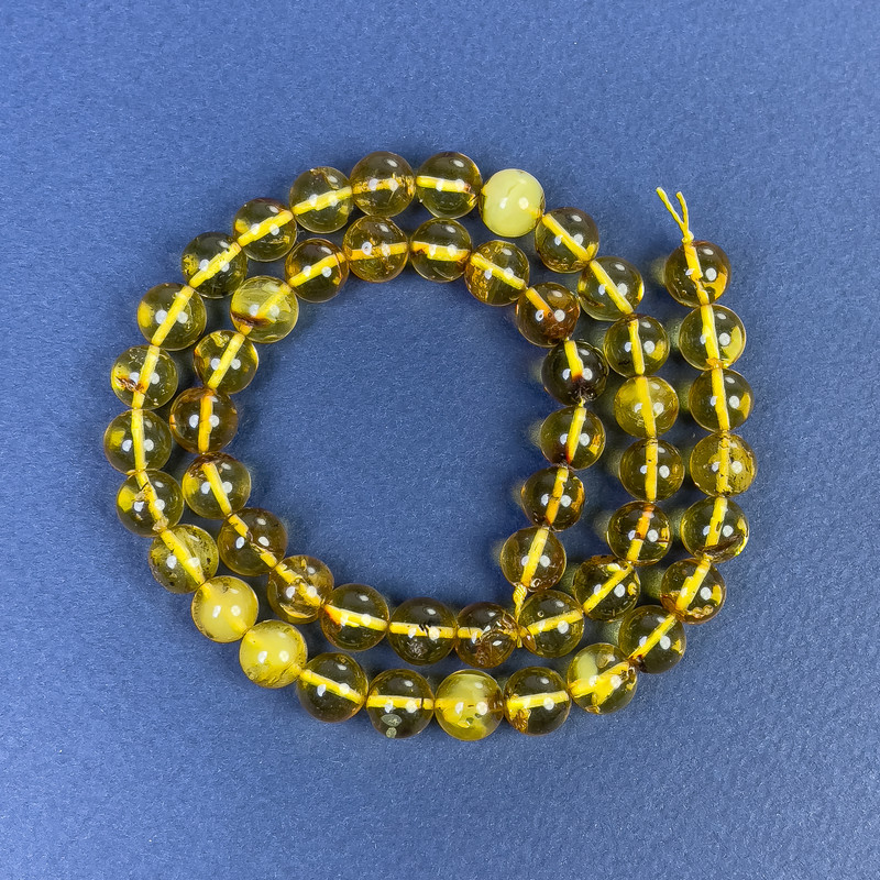 Perles d'ambre lisses 7 mm ± sur fil, longueur 39 cm+