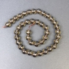 Perles facettées de topaze fumée 10 mm sur fil, longueur 37 cm+