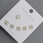 Boucles d'oreilles puces 5 mm ± métal doré, strass blancs