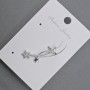 Puce d'oreille dorée avec cabochon et strass blancs 11 × 28 mm ±