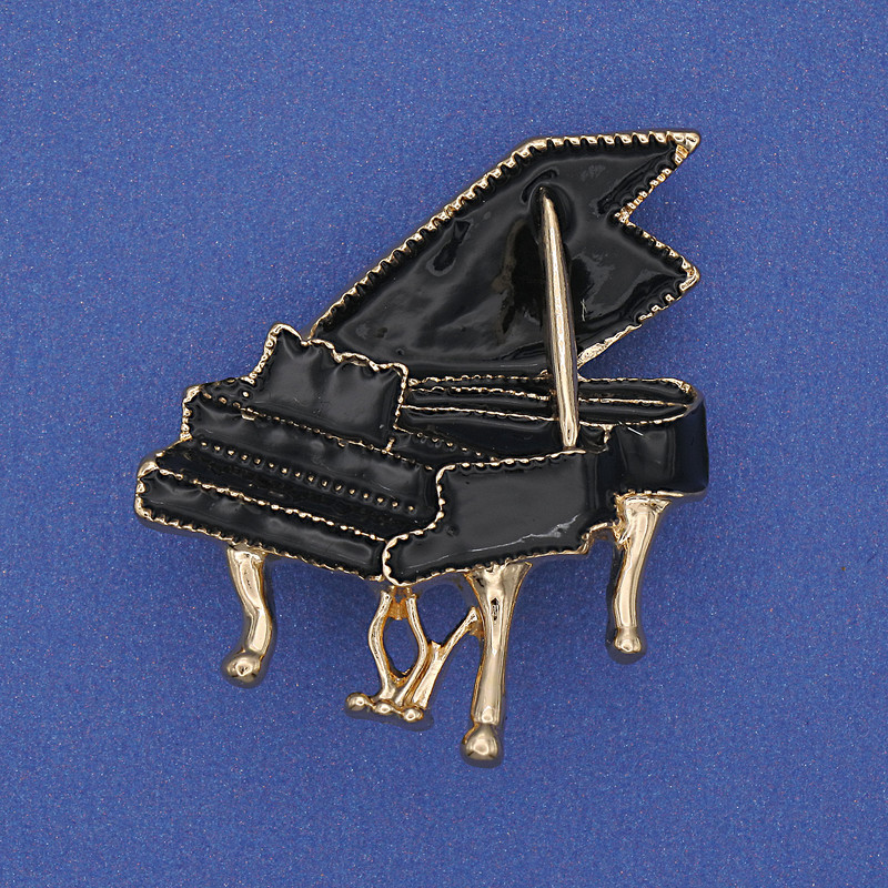 Broche Piano noir émail métal doré 36×30 mm+
