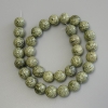 Perles en serpentine pressées, rondes et lisses 12 mm, longueur environ 39 cm, sur fil