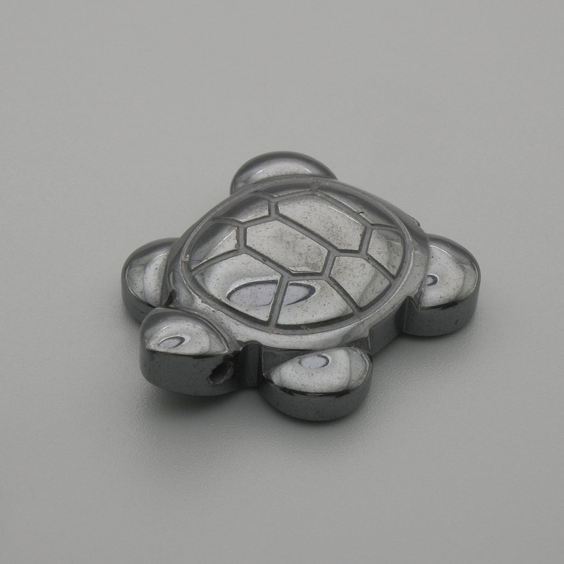 Statuette-souvenir de tortue en hématite 28 × 22 mm+