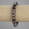 Bracelet rhodoïte cylindrique, diamètre 14 × 10 mm ±, longueur 18 cm ±, élastique