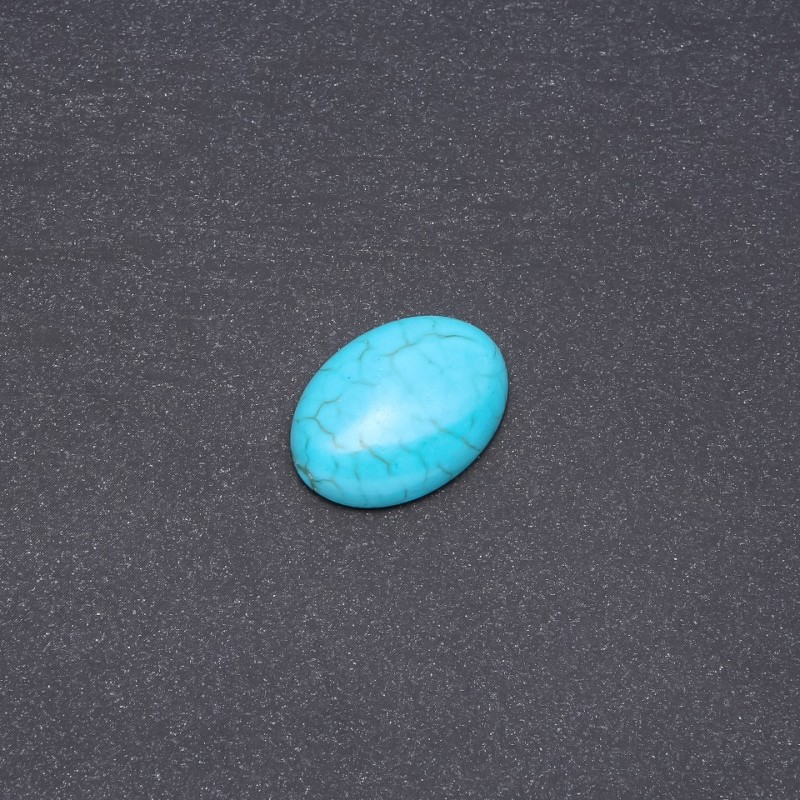 Cabochon en turquoise (pressé) 25×18 mm
