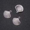 Pendentif coquille 24×25 mm, conditionnement 20 g ± 8 pièces