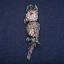 Broche «Cacatoès» 7×1,5 cm métal gris