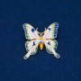 Broche papillon doré en métal et émail, 36×36 mm +