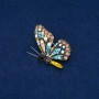 Broche Papillon en métal doré, strass multicolores 40 × 28 mm +