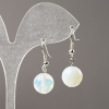 Boucles d'oreilles pierre de lune synthétique, boule facettée, diamètre 12 mm ±, longueur 34 mm ±