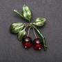 Broche Cerises en métal jaune 55x43 mm