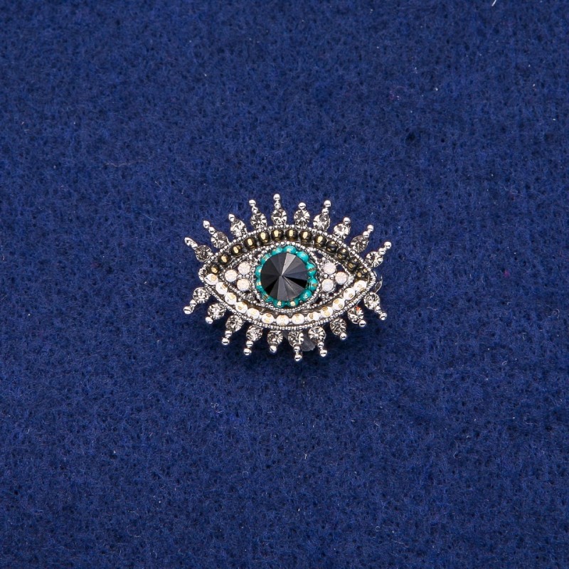 Broche Œil dans les strass argenté 21×26 mm