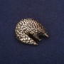 Broche Pangolin 38×28 mm métal jaune