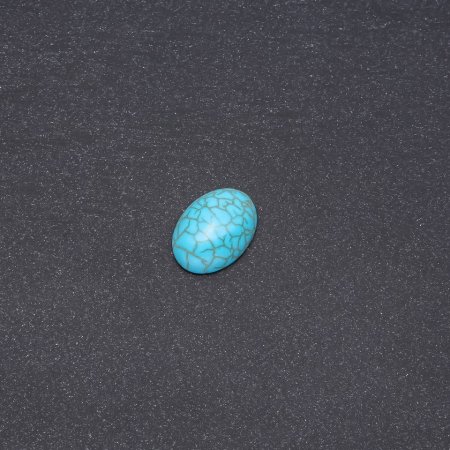 Cabochon en turquoise pressée 20x15 mm
