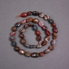 Perles sur fil de pietersite naturel, facettées, diamètre 7×10 mm, longueur 38 cm ±